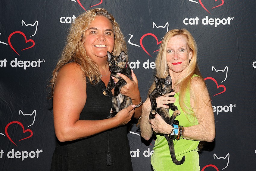 Volunteers Jenni Schaffranek and Ivy, with Piper Lyons and Laurel