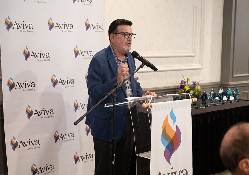 Board Chairman Marc Lazarus addresses guests.