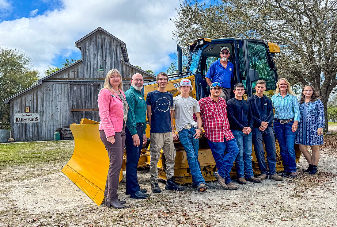 Students, faculty and staff from the Heavy Equipment Operations Technician program at Flagler Technical College were on hand at the Florida Agricultural Museum for the arrival of the latest piece in their career and technical education arsenal. Courtesy photo