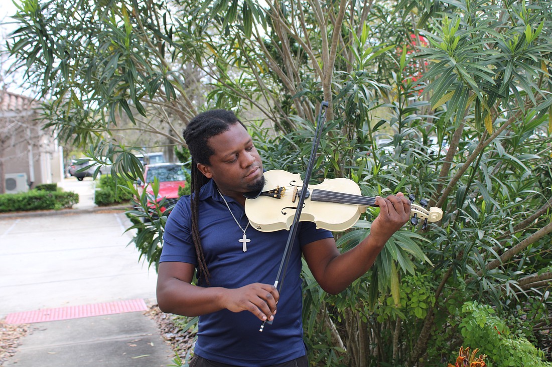 Marcus McKinnon goes by "Black Guy White Violin" to make it easier for people to look him up online. Photo by Alexis Miller