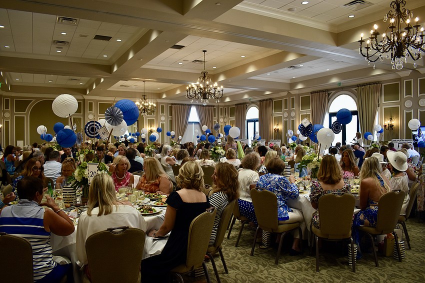 About 240 people attend the Divas and Dogs fashion show at the Lakewood Ranch Country Club on March 15.