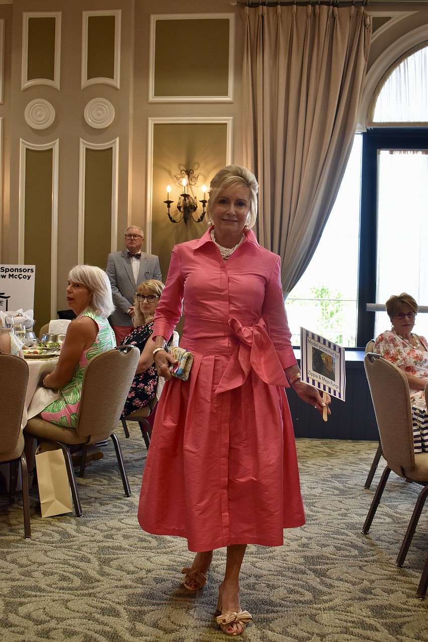 Susan Jenkins models in the Divas and Dogs fashion show on March 15.