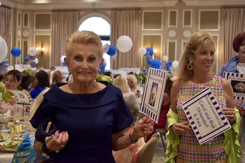 Mary Jo Hansen leads the models for the final walk.