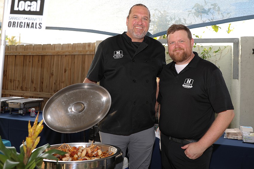 The always smiling Hal Christenson and Josh Shields are serving Harry's colorful shrimp chorizo. Lollipop