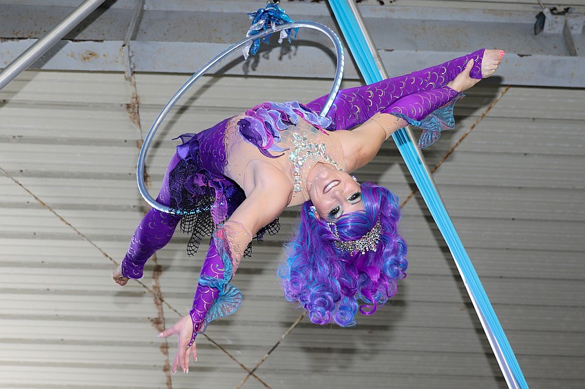 Lyric Wallenda-Arestov from Cirque Vertigo wows the crowd from some 30 feet above the event.