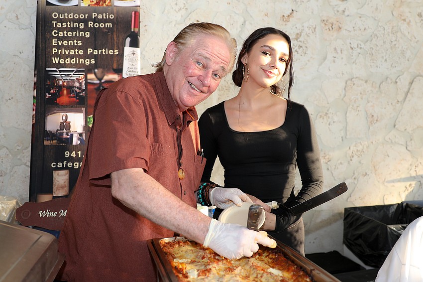 Peter Tracy and Bella Littlejohn from Café Gabbiano on Siesta Key are serving lasagna. Bolognese