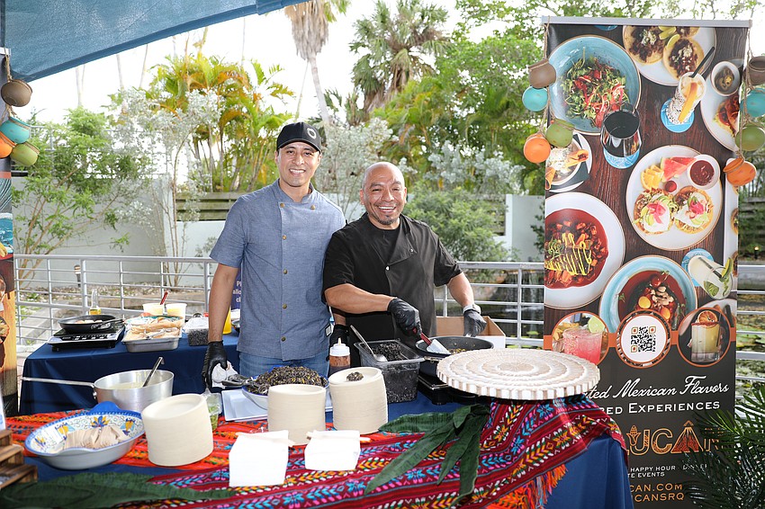 José Rojas and Gino Calleja from Callo De Hacha De Colimo are excited for guests to try their pan-seared sea scallops.