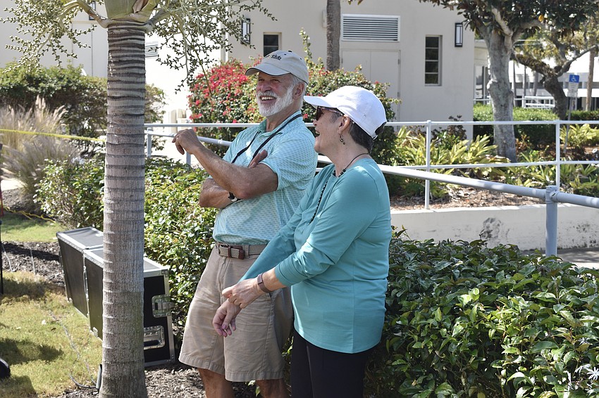 Volunteers David Murphy and Louise Coogan watch the performance.