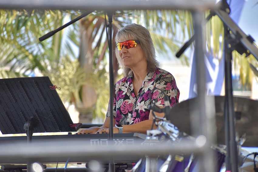 Judi Glover plays keyboard with the Pete BarrenBregge Band.