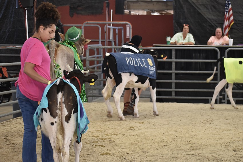 Participants take a trip around the arena, with eighth grader Alex Ultsch and Pumpkin in back.