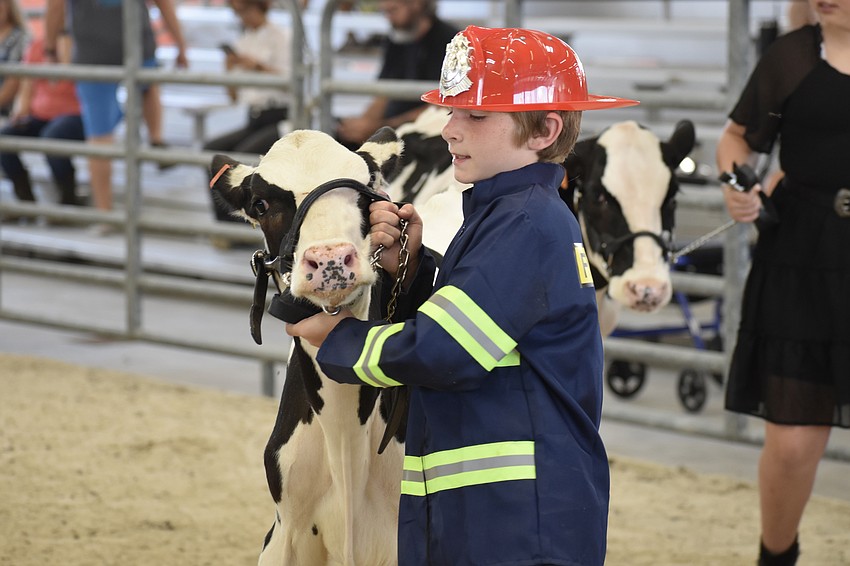 Third grader Roko Vrbanovich takes to the arena with Milkshake.