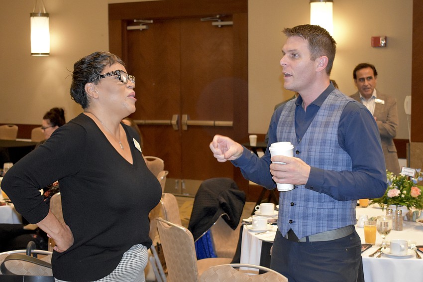 Tracie Cardwell talks with Brian Partie.