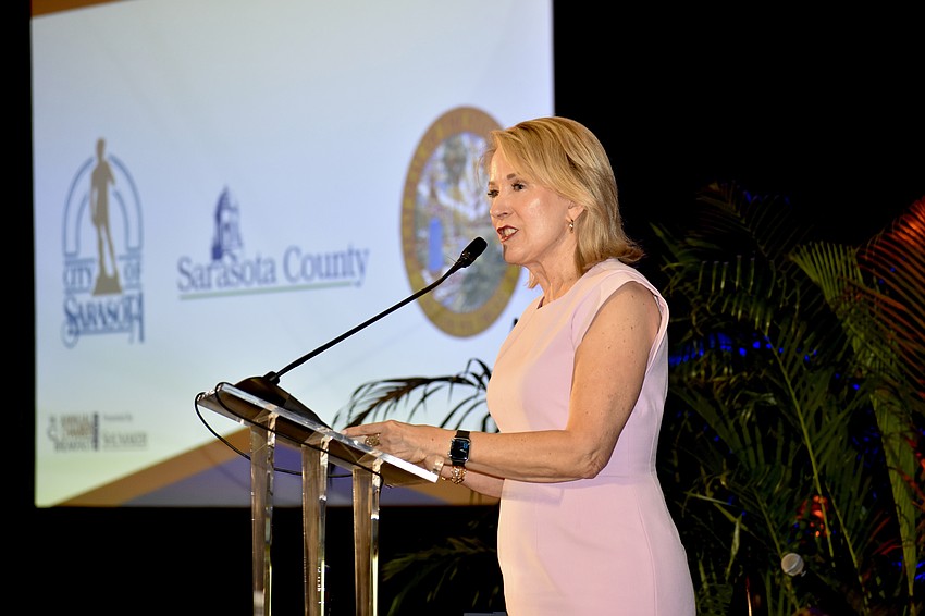 Chair of the board Teri Hansen, of the Charles & Margery Barancik Foundation, offers a speech.