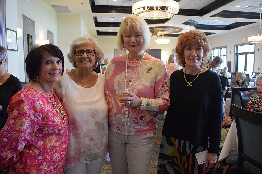 The River Strand Fashion Team of Lil Vivona, Eloise Eckler and Christine Levine work with Jan Nicolson, the owner of Wish Boutique, to coordinate a fashion show to raise money for the Food Bank of Manatee.