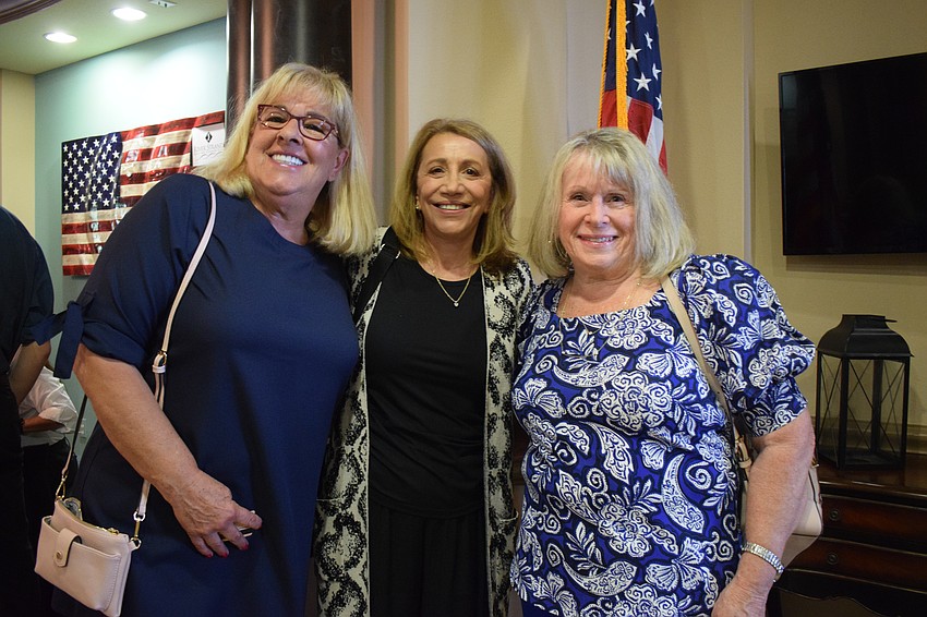 River Strand's Marie Larsen, Cecelia Hunsberger and Helen Macdonald are ready for the fashion show.