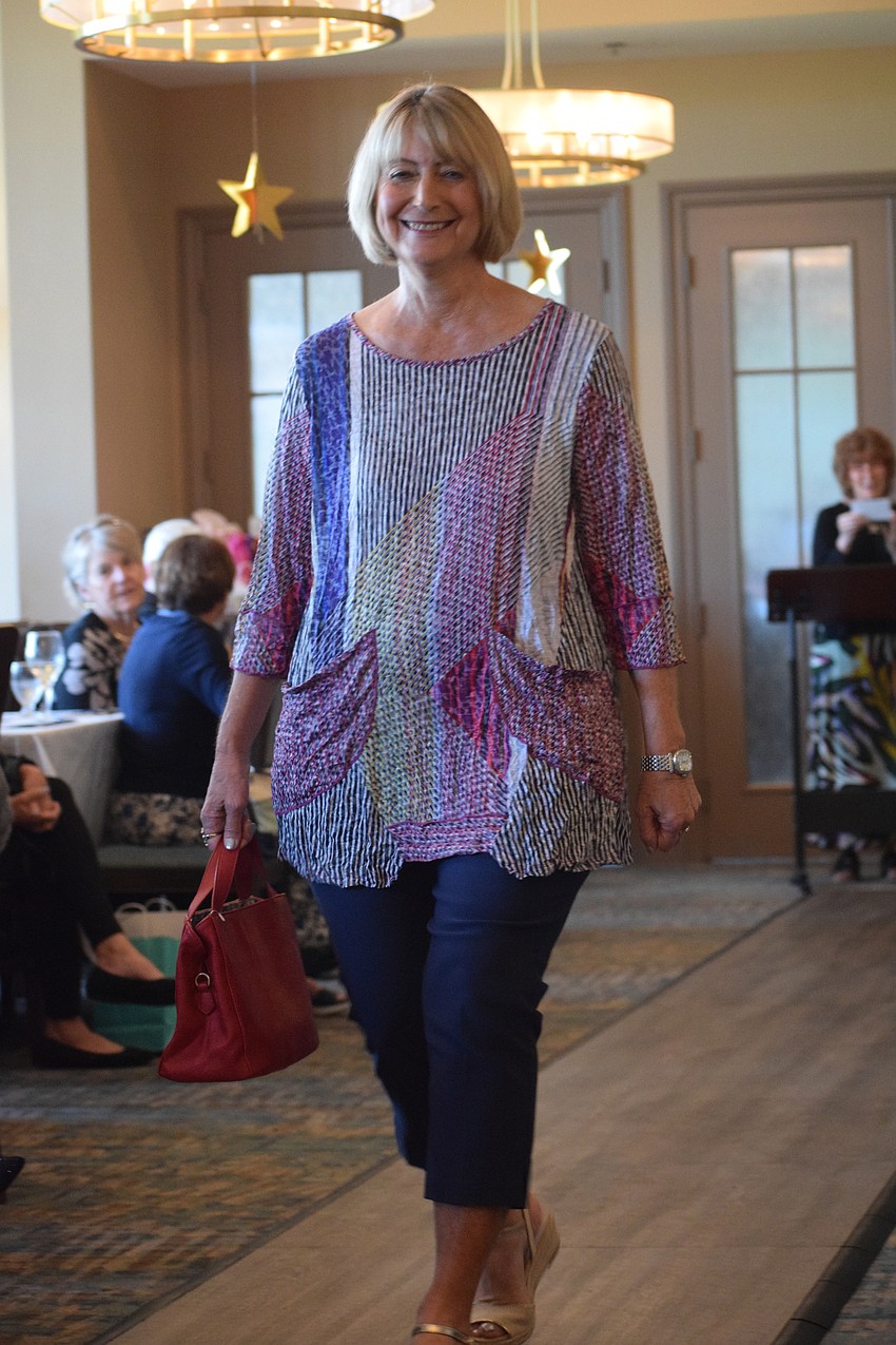 River Strand's Jean Scheuer participates in the annual fashion show for the first time. Residents only are allowed to be models once so more residents can participate.