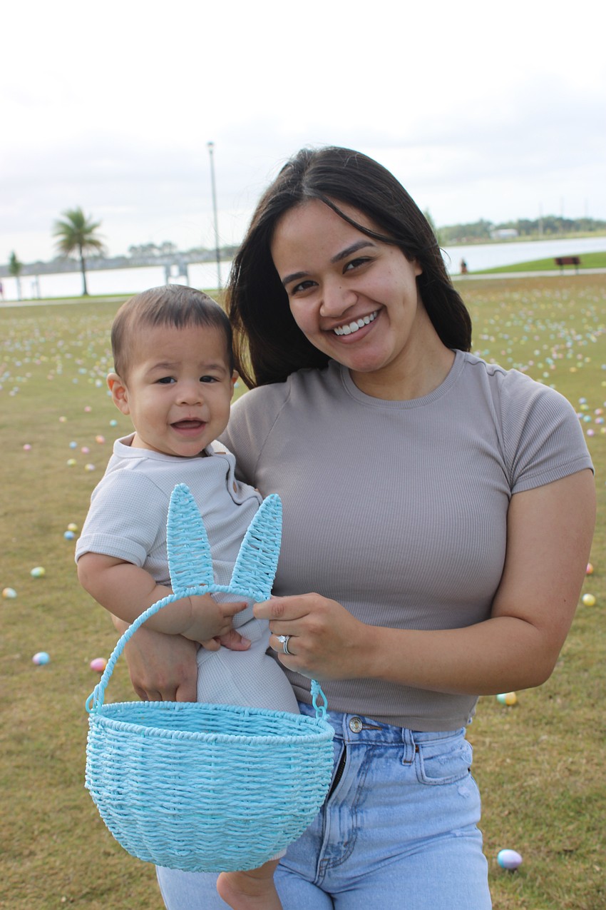 Lakewood Ranch's Enzo Cruz, 7 months old, enjoys his first Eggstravaganza with mom Brianna Cruz at Waterside Park March 23.