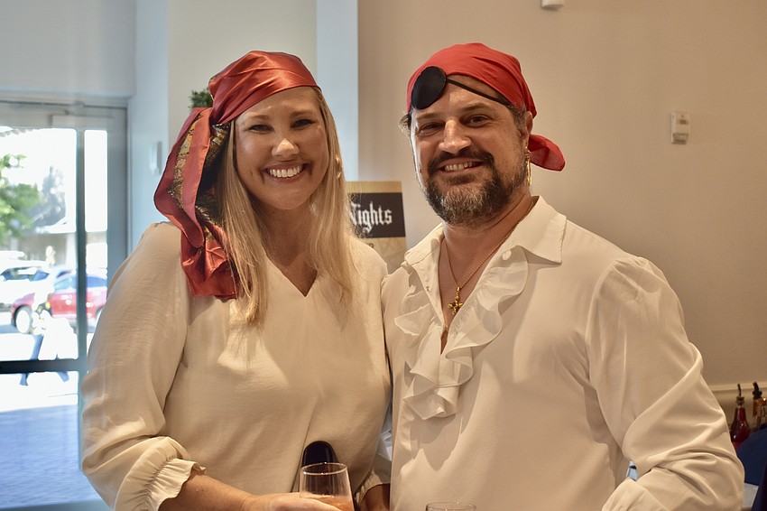 Melissa and Keith Pandeloglou enjoy Saturday night mate night as a couple of pirates.