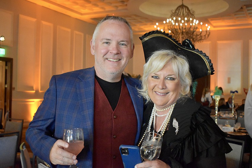 Patrick Wright and Maribeth Phillips, Meals on Wheels Plus CEO, enjoy the music in the ballroom.