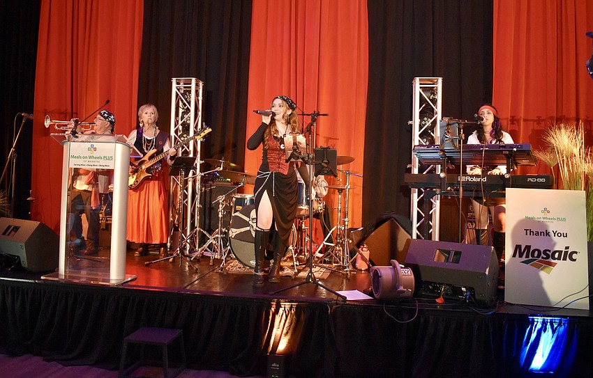 Tropical Ave Band performs for the crowd.