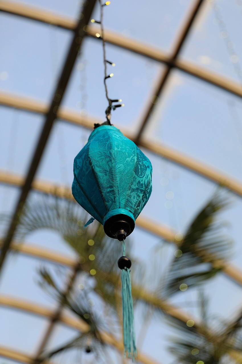 The Michael's On East atrium was decorated with hanging lanterns for the Lighthouse Art in the Dark 2024 gala.