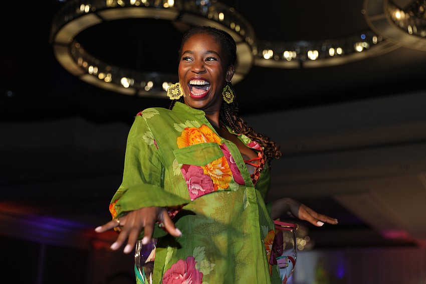 Faith Adesanya walks the SPARCC Runway show.
