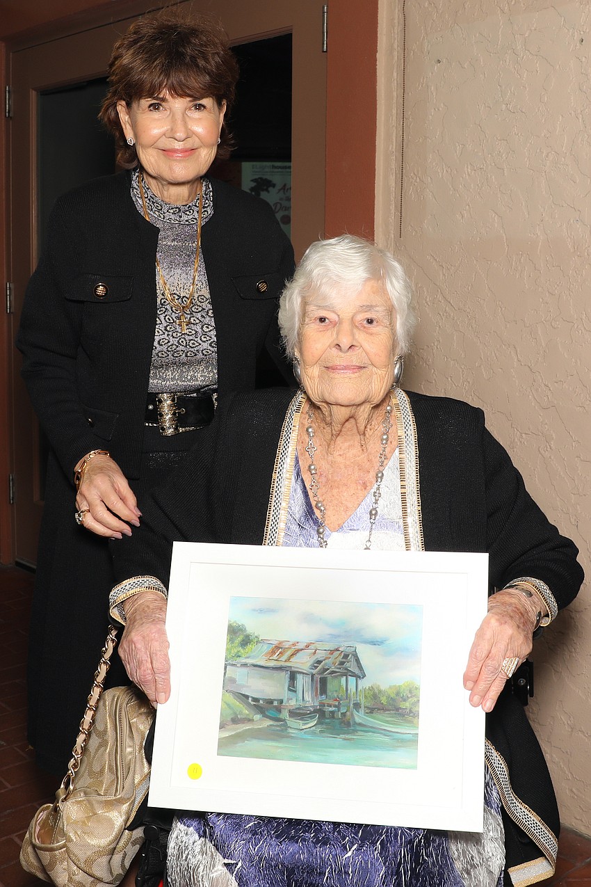 Artist Gail Cristello, and her mom, artist Margaret Feingold, who was an art teacher at Wilkinson Elementary School for 27 years. Margaret's artwork, 'Early Sarasota' was donated to the silent auction.