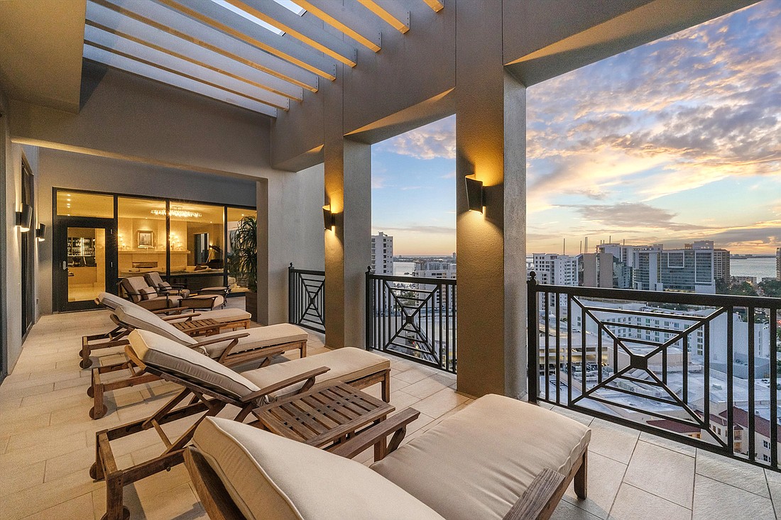 The balcony of Congressman Vern Buchanan's former penthouse in The Plaza at Five Points offers views of downtown and Sarasota Bay.