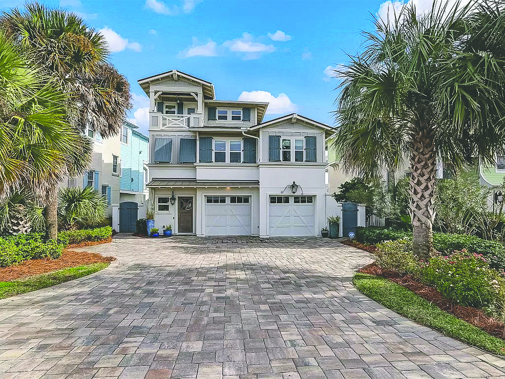 Oceanfront three-story home features five bedrooms, four full and one half-bathrooms, porches, elevator, outdoor kitchen, pool and dune walkover.