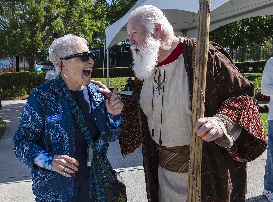 Rita Gallin jokes around with Moses (Chris Jessup) at the 2022 Jewish Heritage Festival. File photo by Michele Meyers