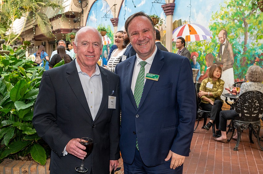 Mark Sherin and Cihan Cobanoglu, dean of USF School of Hospitality and Tourism Management