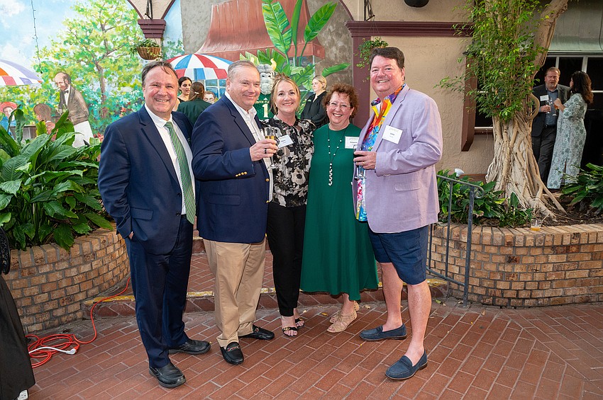 Cihan Cobanoglu, USF dean of  School of Hospitality & Tourism Management, Mike and Mary Quillen, and Amanda and John Horne