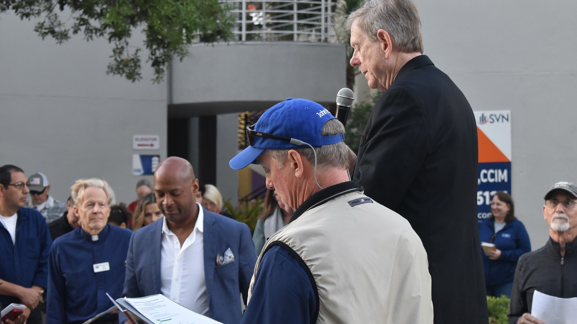 Believers walk the Stations of the Cross along Main Street | Your Observer