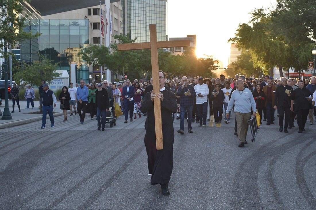 The Rev. David M. Svihel leads the walk