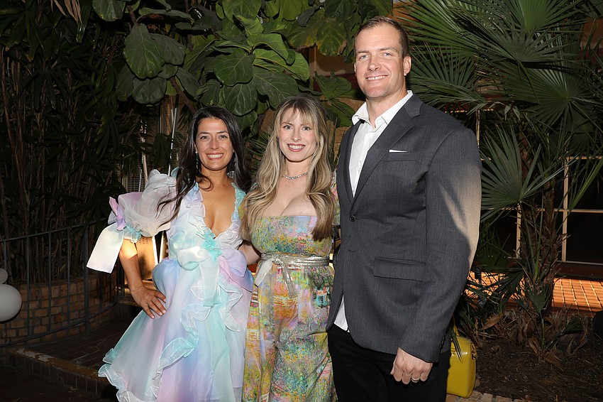 Sarah Anderson, with art teacher Amber Richter and her husband, Jimmy