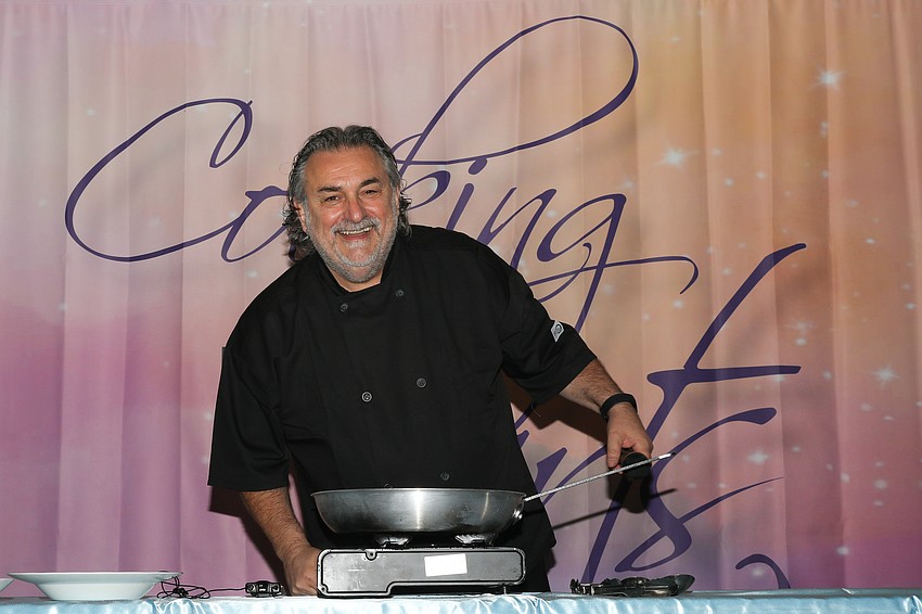 Phil Mancini of Michael's On East is prepared to begin cooking.