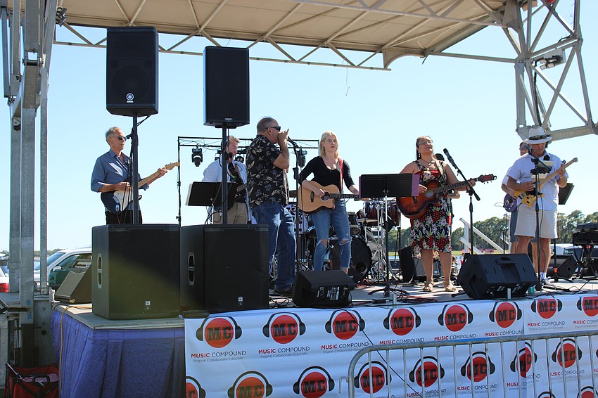 The Jam Band of the Music Compound entertains during Musicpalooza at Nathan Benderson Park. Five other bands comprised of Music Compound students took the stage.
