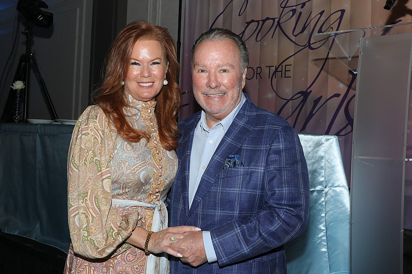 Terri and Michael Klauber, who was the live auctioneer.