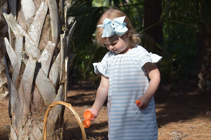 Harper Skibicki, 2, grows her collection of eggs.