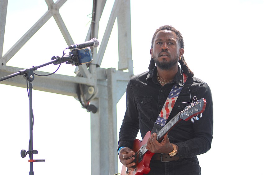 Evan Taylor Jones of the American Jones group entertains the crowd at My Hometown Fest at Nathan Benderson Park Saturday.