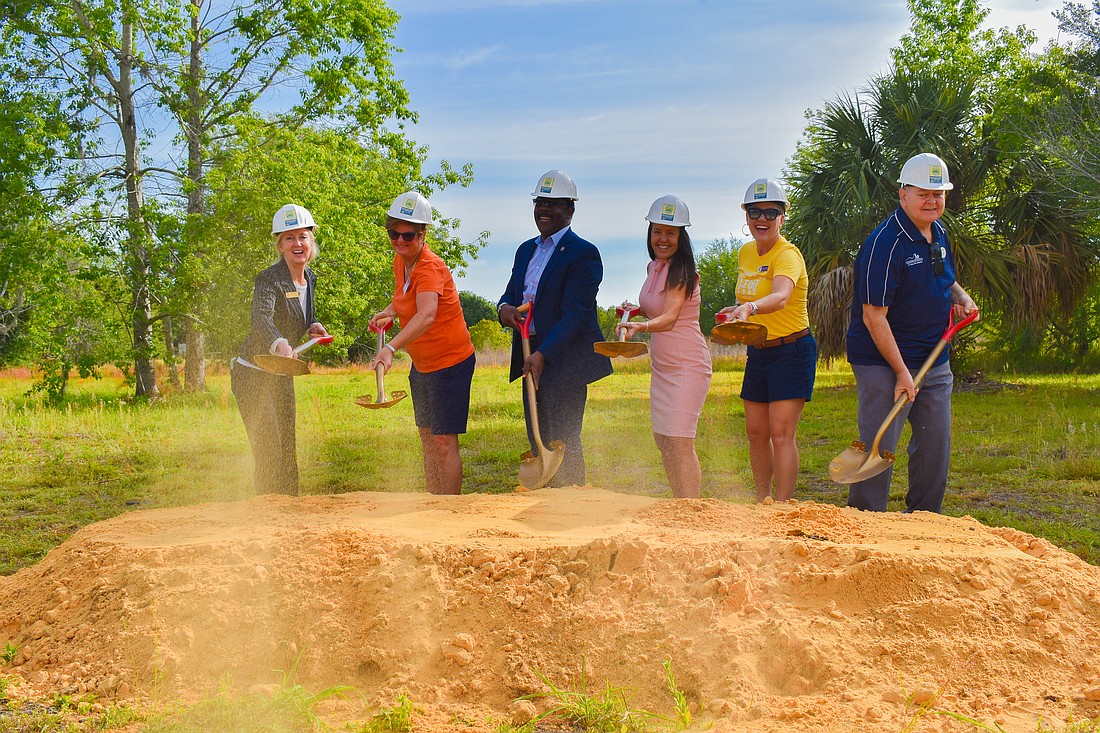 Several community leaders joined Mayor Jerry L. Demings and District 1 Commissioner Nicole Wilson to shovel the first scoop of dirt at Bentonshire Park.