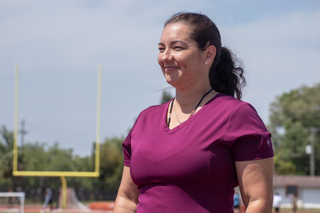 Rosita Reyes is in her first season as the Sarasota High track and field coach.