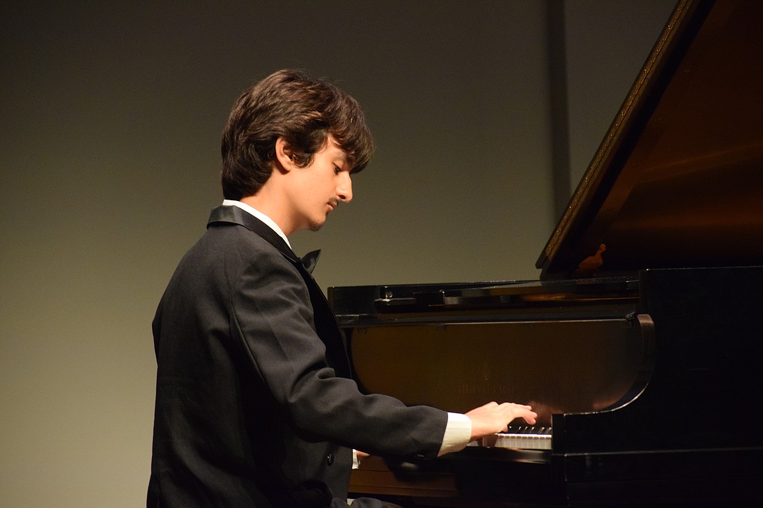 Lakewood Ranch High School senior Jared Mohr plays piano at Arts Alive. It was his first public performance after starting to learn how to play piano two years ago.