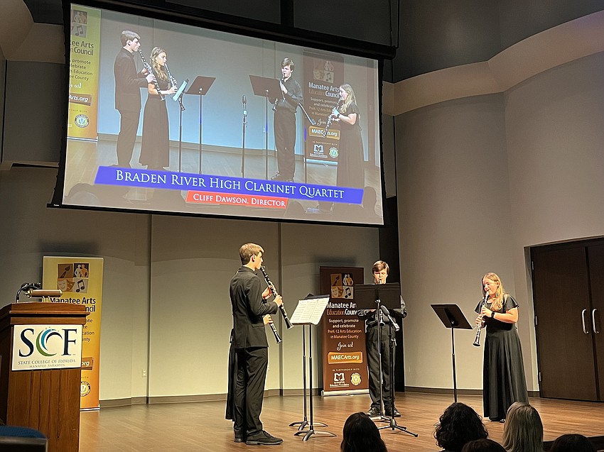Braden River High School seniors Nick Teta and Nyah Platt, junior Matthew Bowers and sophomore Alexa Helton perform as a clarinet quartet at Arts Alive.