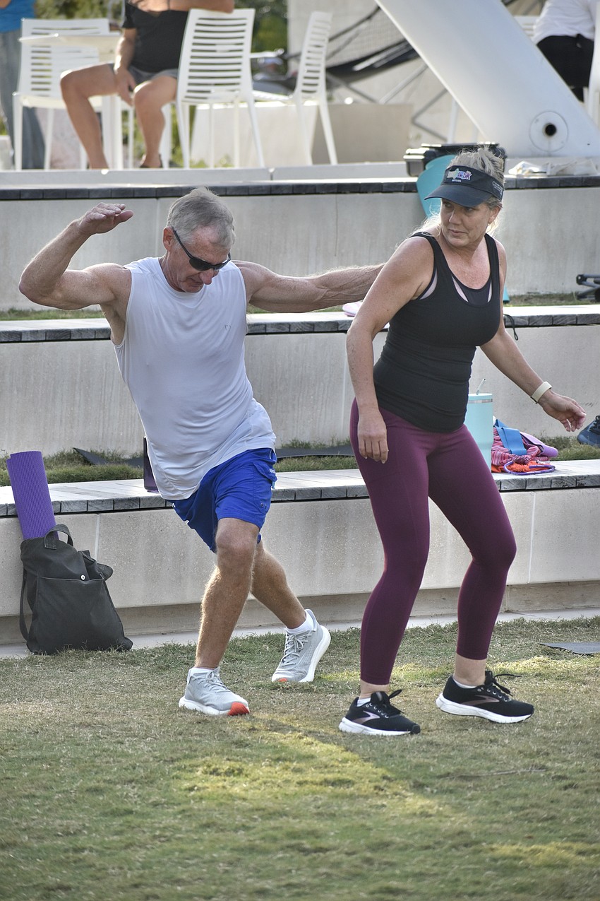Jeff Berman and his girlfriend Bonnie Seguin work out during Bootcamp Fitness with The Y.