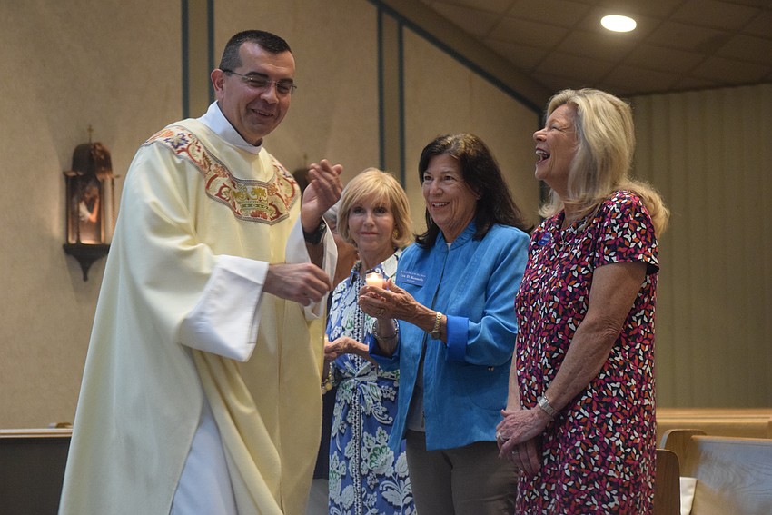 The Rev. Robert Dziedziak, Susan Clarke, Lynn Kennelly and Kay Kochenderfer