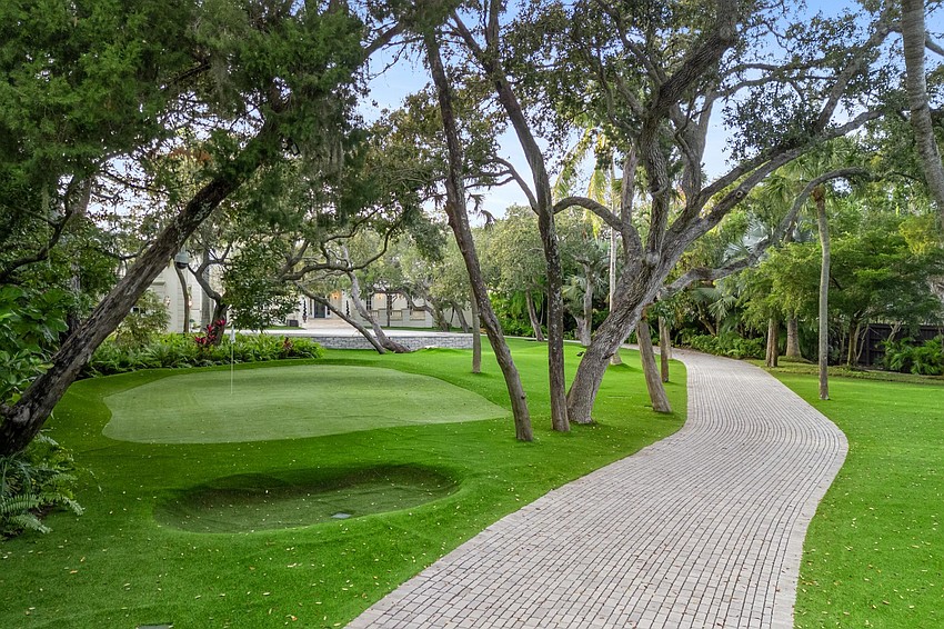 The outdoor patios and balconies oversee a deck, new pool, spa, and manicured grounds.