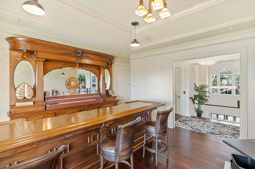 A bar is an unusual feature of this 8,623 square-foot home at 4300 Higel Ave.