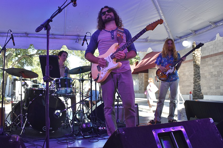 John Medico, Alberto Donadi and Jack Berry perform with Donadi's group.
