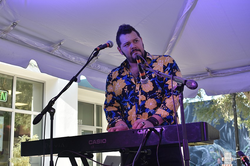 Rafael Ruffus plays keyboard with Albert Donadi.